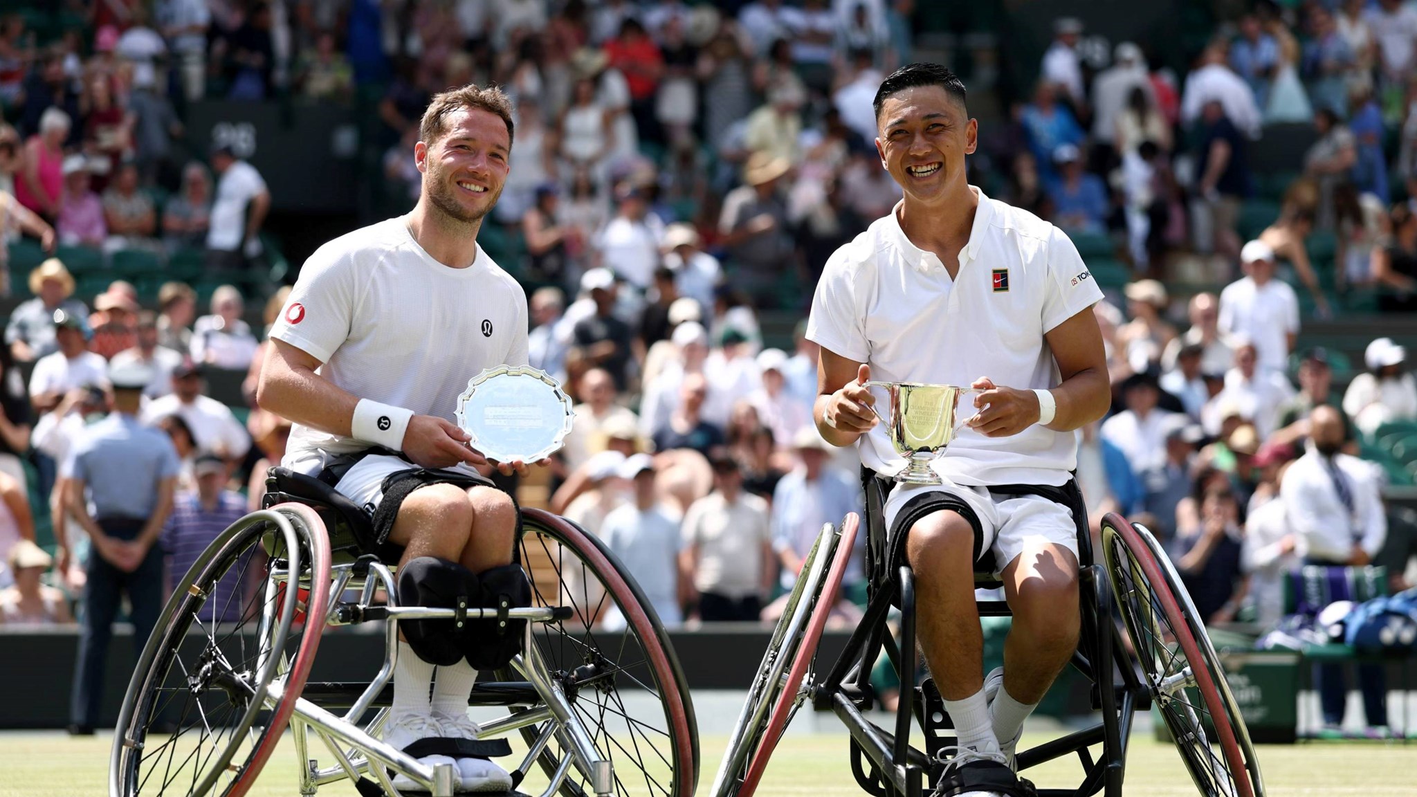 Alfie Hewett and Tokito Oda posing with trophies at Wimbledon