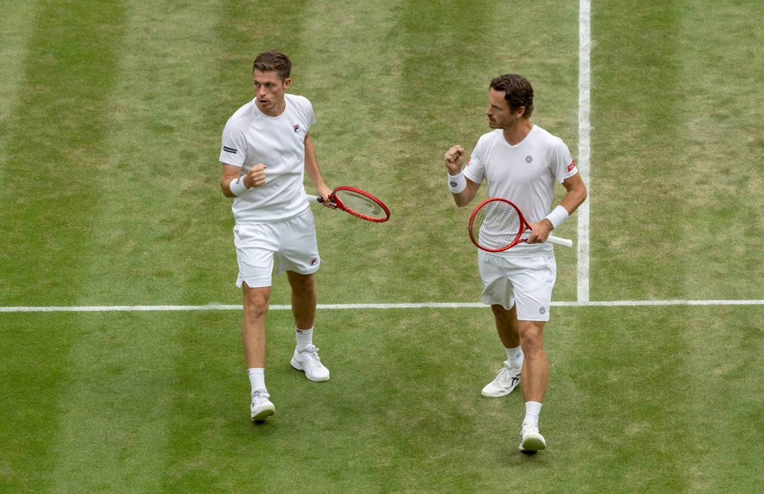 Neal Skupski and Wesley Koolhof fist pump in the semi-finals at Wimbledon