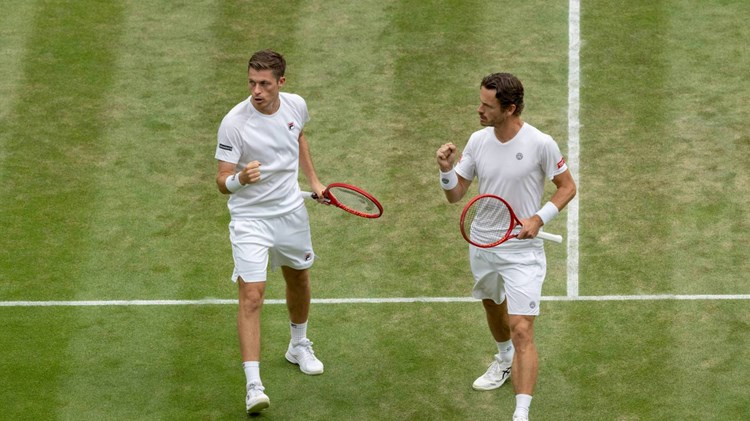 Neal Skupski and Wesley Koolhof fist pump in the semi-finals at Wimbledon