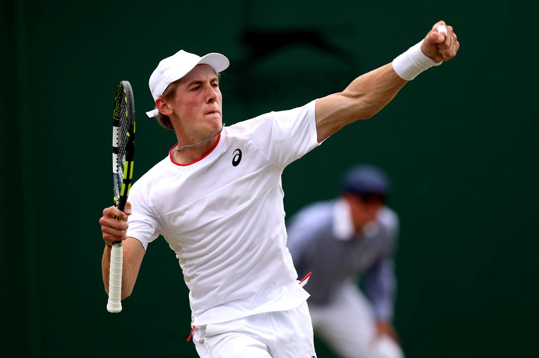 Henry Searle celebrates reaching the Boys' singles semi-final at Wimbledon 