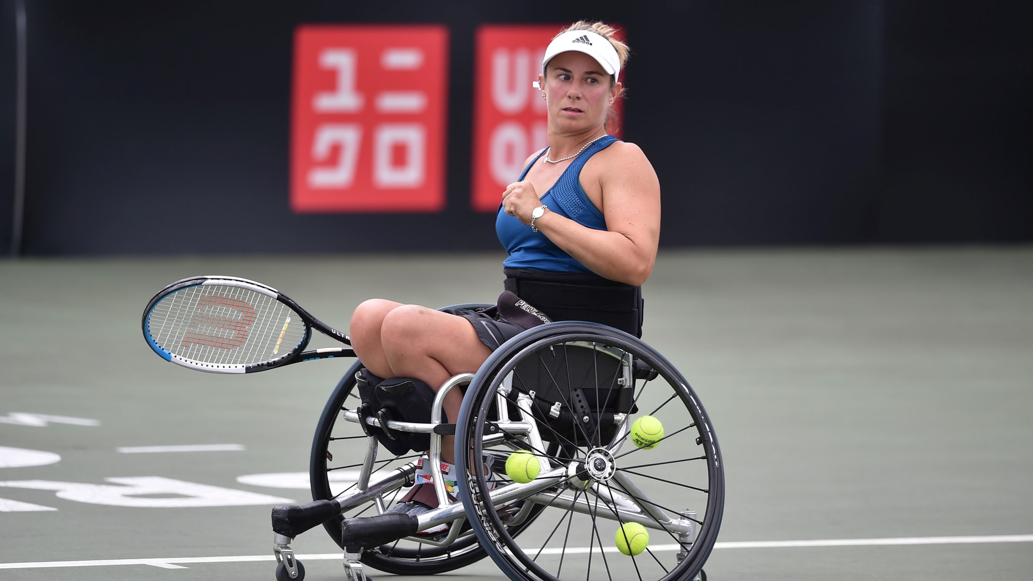 Lucy Shuker celebrating after winning a point during  her women's singles quarter-final match at the 2022 British Open