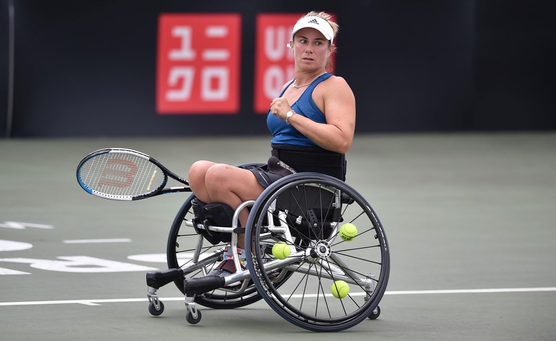 Lucy Shuker celebrating after winning a point during  her women's singles quarter-final match at the 2022 British Open