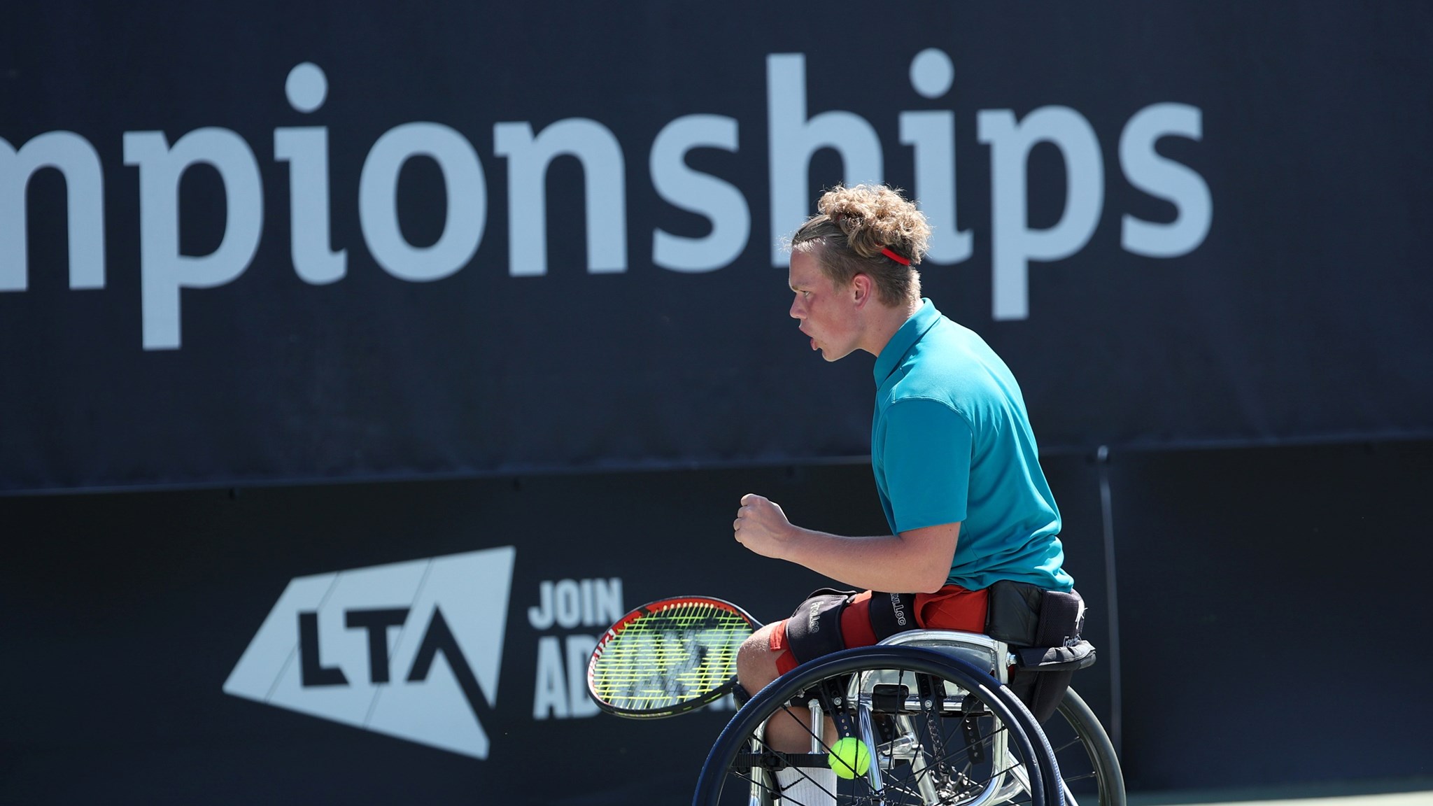 Ben Bartram celebrating winning a point during the finals of the Nottingham Futures men's singles tournament