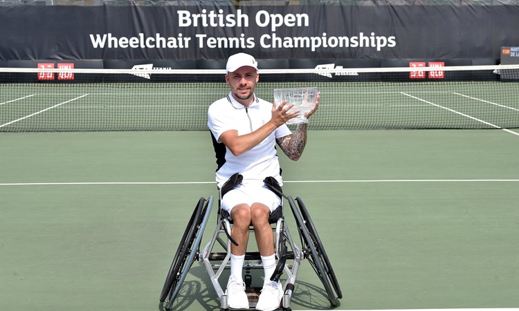 Andy Lapthorne poses with the trophy after being crowned the 2022 champion of the British Open quad singles event