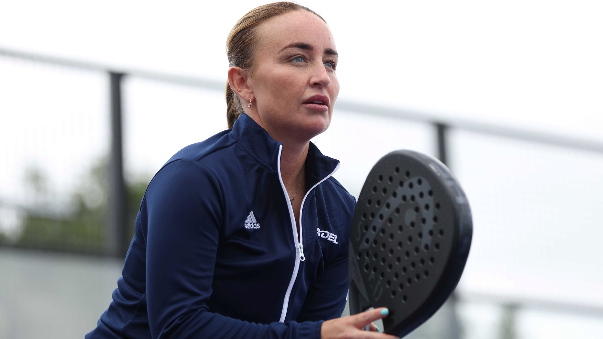 Great Britain's Aimee Gibson holding a padel racket on court waiting for a shot