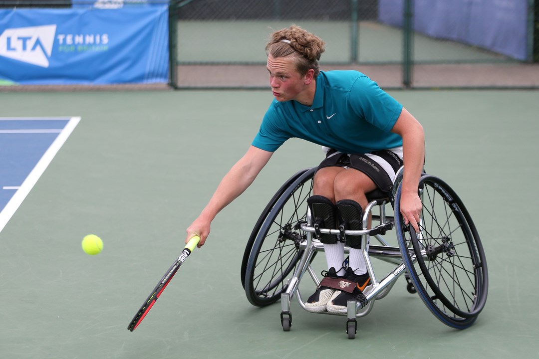 Ben Bartram plays a backhand during Day Four of the British Open Wheelchair Tennis Championships 2022