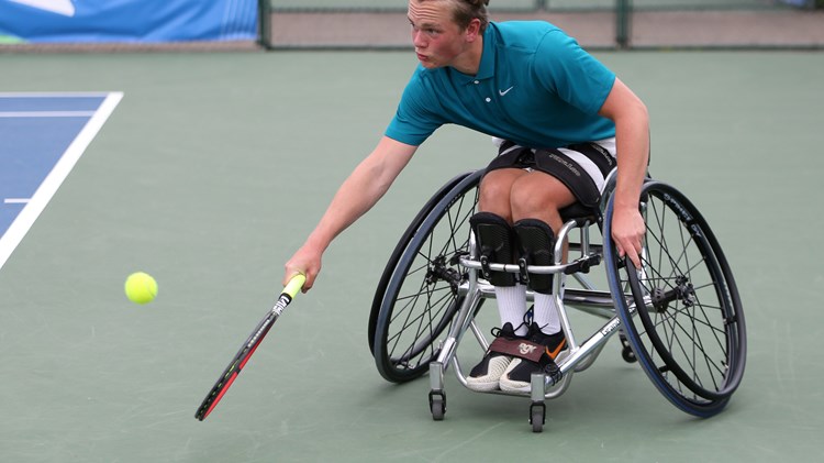 Ben Bartram plays a backhand during Day Four of the British Open Wheelchair Tennis Championships 2022