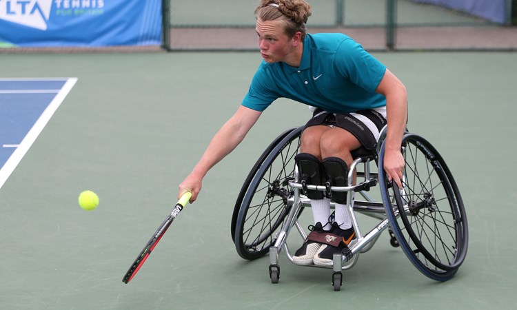 Ben Bartram plays a backhand during Day Four of the British Open Wheelchair Tennis Championships 2022