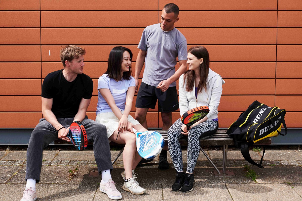 group-of-people-sitting-down-after-playing-padel.jpg