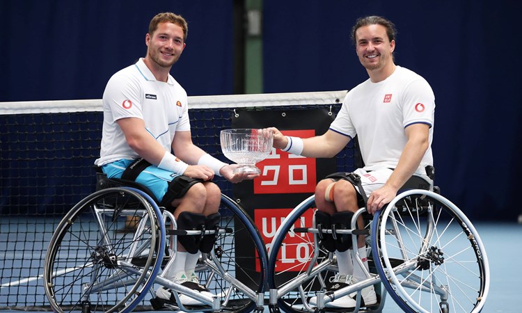 Alfie Hewett and Gordon Reid of Great Britain pose for a photo with the winners trophy after victory over Martin de la Puente of Spain and Gustavo Fernandez of Argentina in the men's doubles final during the Lexus British Open Wheelchair Tennis Championships at Lexus Nottingham Tennis Centre on August 05, 2023 in Nottingham, England.