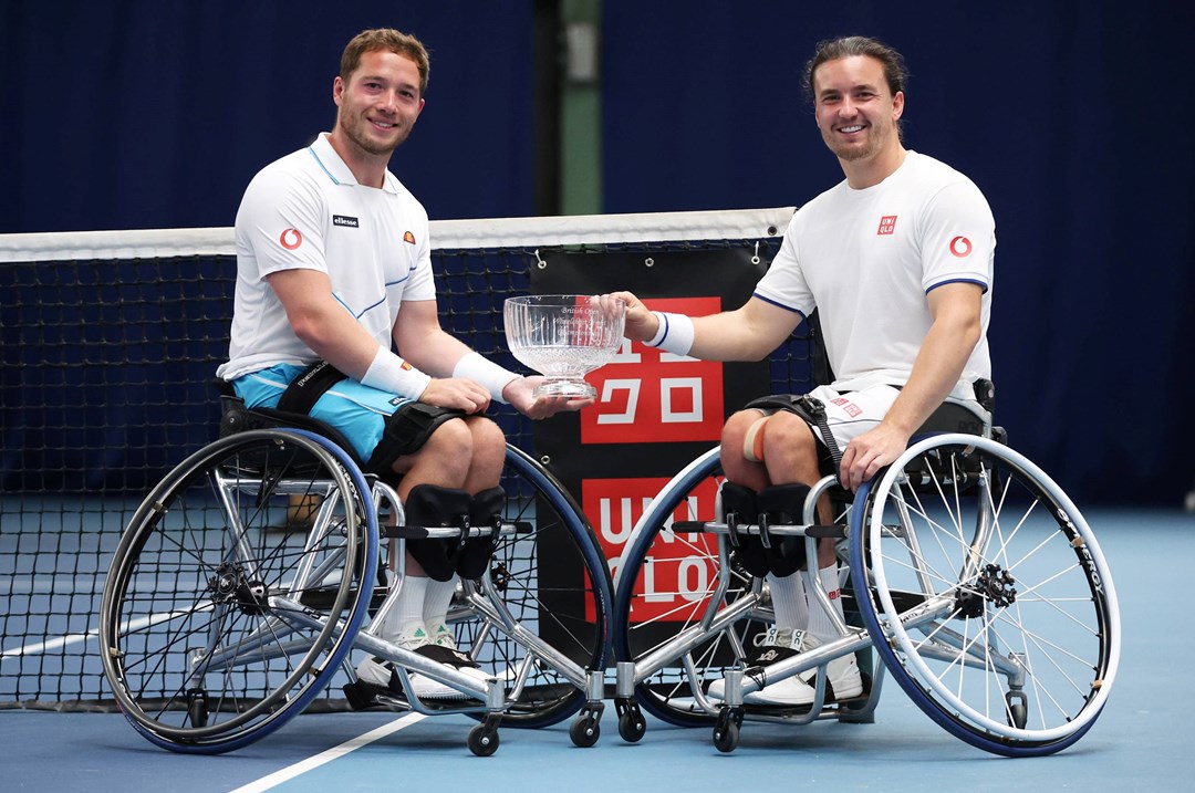 Alfie Hewett and Gordon Reid of Great Britain pose for a photo with the winners trophy after victory over Martin de la Puente of Spain and Gustavo Fernandez of Argentina in the men's doubles final during the Lexus British Open Wheelchair Tennis Championships at Lexus Nottingham Tennis Centre on August 05, 2023 in Nottingham, England.