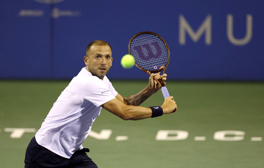 Dan Evans lines up a volley in the Citi Open