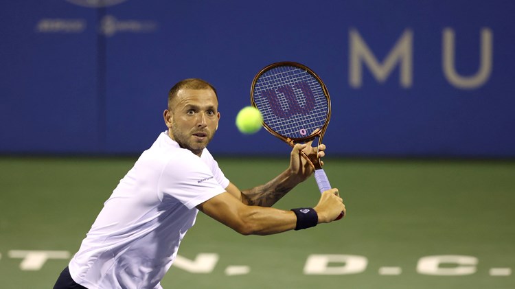 Dan Evans lines up a volley in the Citi Open