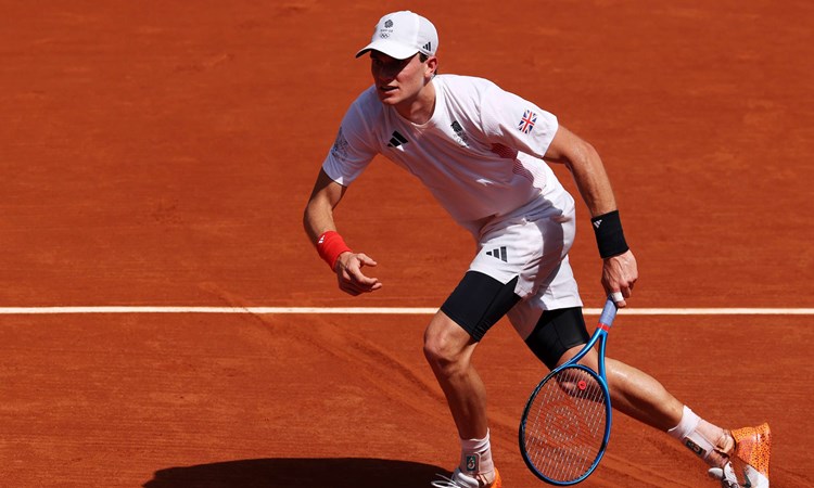 Jack Draper moving to hit a ball on a clay court