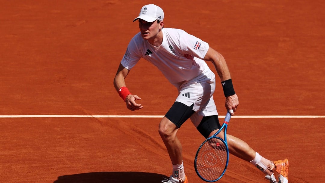 Jack Draper moving to hit a ball on a clay court