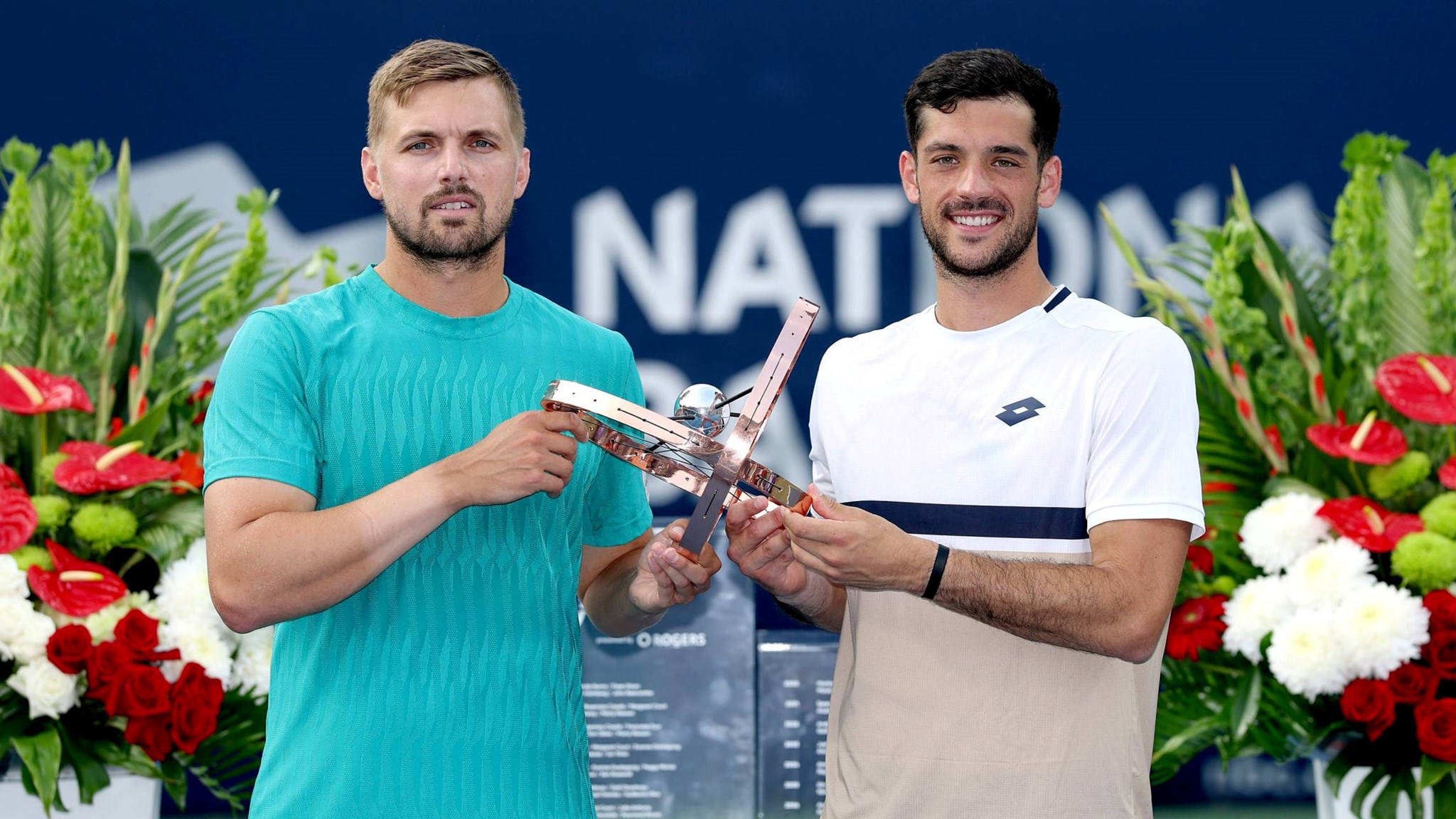 Lloyd Glasspool and Julian Cash holding the National Bank Open title in Toronto