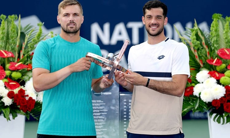 Lloyd Glasspool and Julian Cash holding the National Bank Open title in Toronto