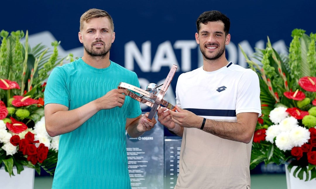 Lloyd Glasspool and Julian Cash holding the National Bank Open title in Toronto