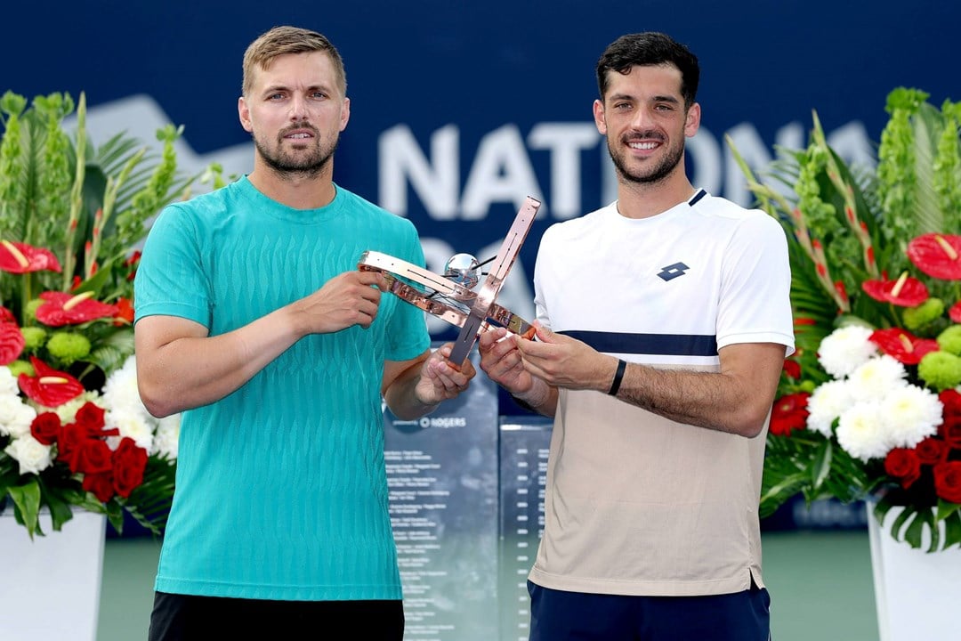 Lloyd Glasspool and Julian Cash holding the National Bank Open title in Toronto