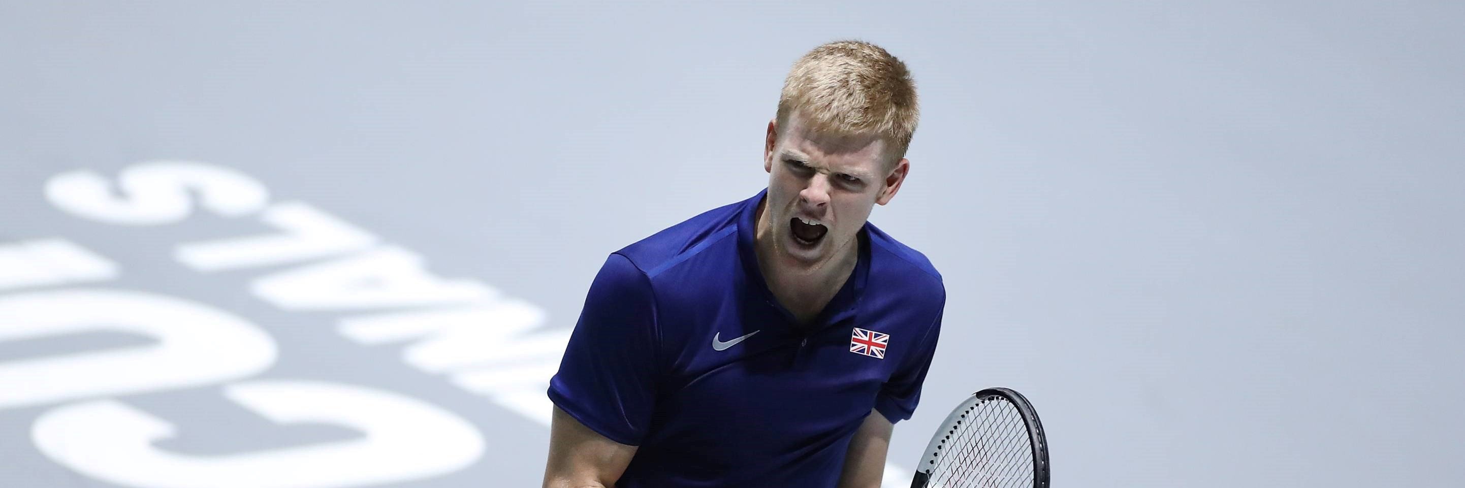 Lyle Edmund celebrates winning against Feliciano Lopez at the 2019 Davis Cup Finals