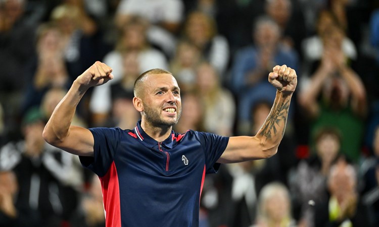 Dan Evans celebrates winning the quarter-final at the 2022 National Bank Open