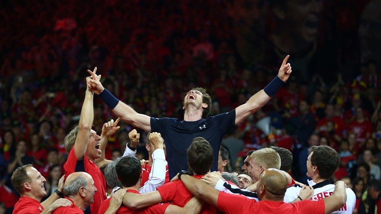 Andy Murray celebrates with his team after winning the singles match against David Goffin after clinching the Davis Cup title back in 2015