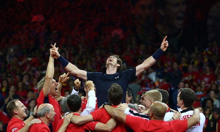 Andy Murray celebrates with his team after winning the singles match against David Goffin after clinching the Davis Cup title back in 2015