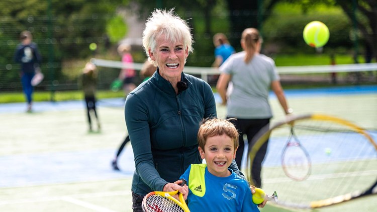 Judy Murray playing tennis with a junior player at Newlands Park Tennis Centre in Glasgow