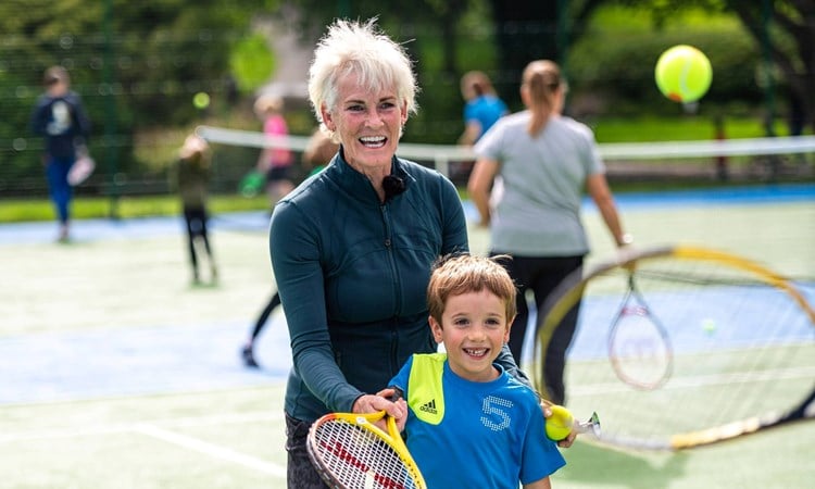 Judy Murray playing tennis with a junior player at Newlands Park Tennis Centre in Glasgow