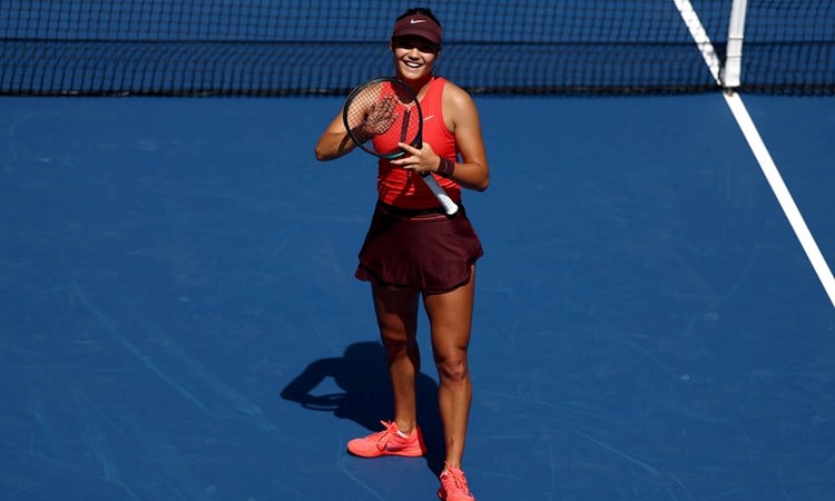 Emma Raducanu applauds the crowd after a first round win at the 2025 US Open