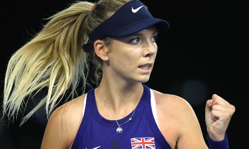 Katie Boulter celebrating in a tennis match
