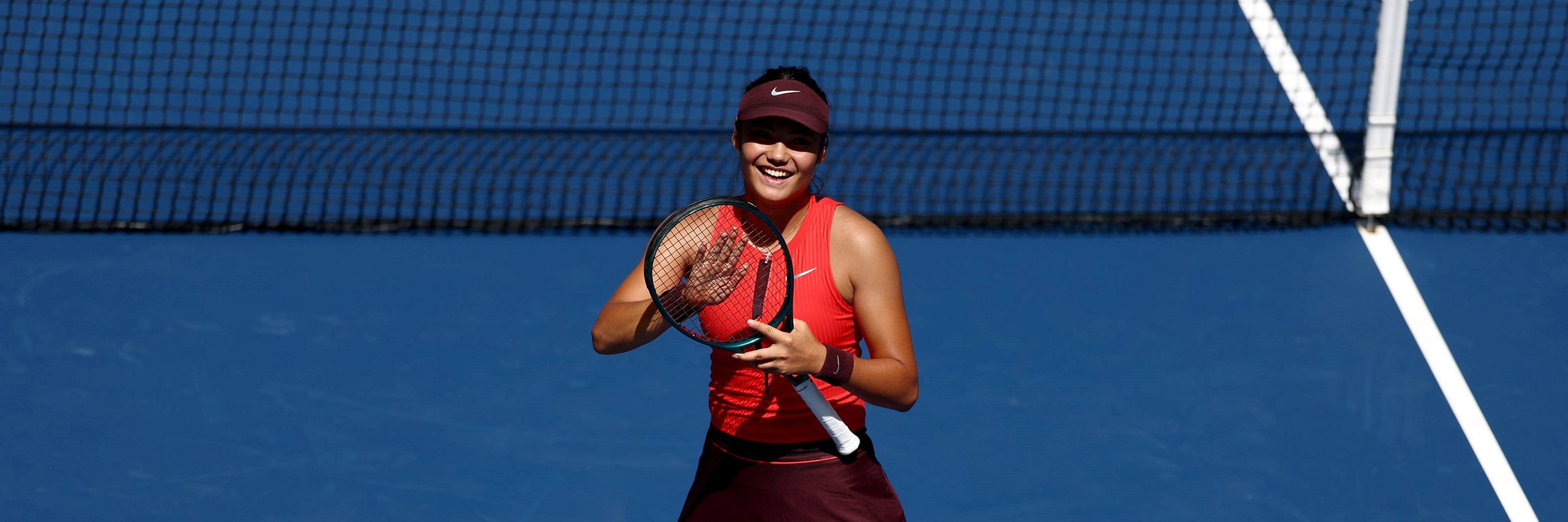 Emma Raducanu applauds the crowd after a first round win at the 2025 US Open