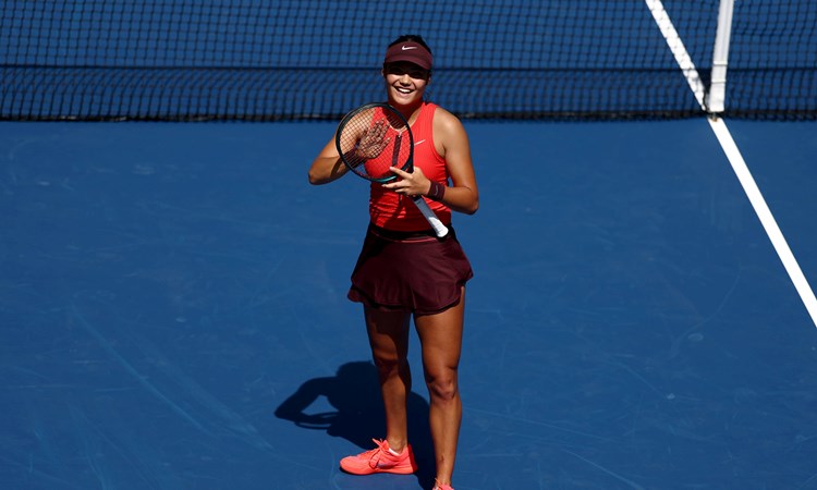 Emma Raducanu applauds the crowd after a first round win at the 2025 US Open