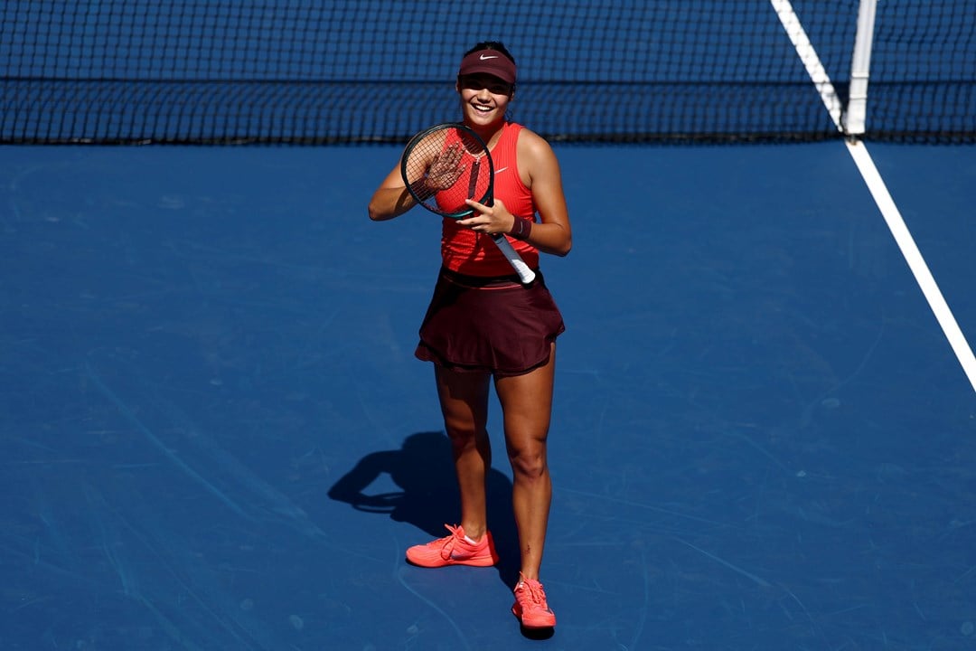 Emma Raducanu applauds the crowd after a first round win at the 2025 US Open