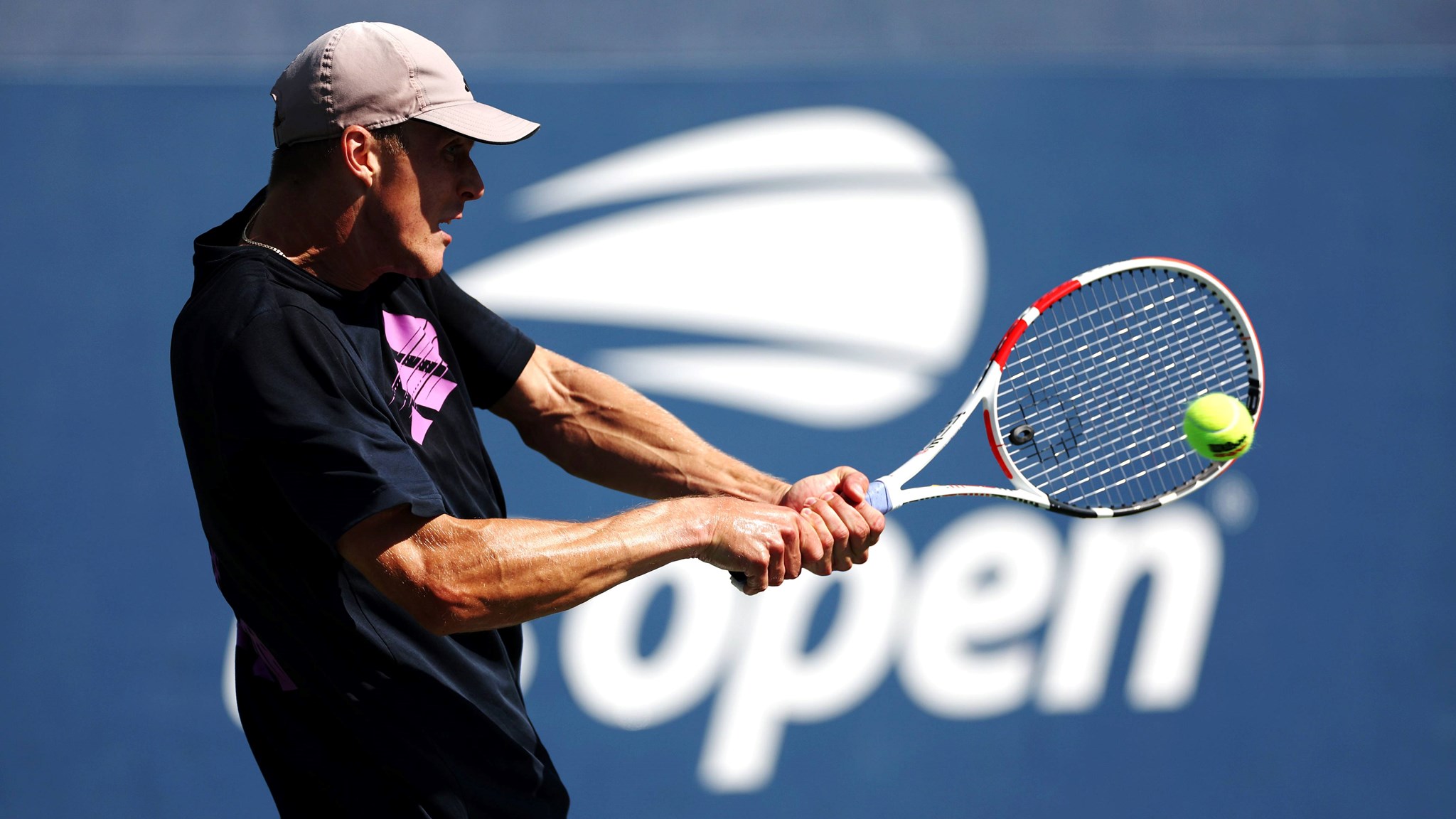 Jan Choinski hits a backhand in qualifying at the US Open