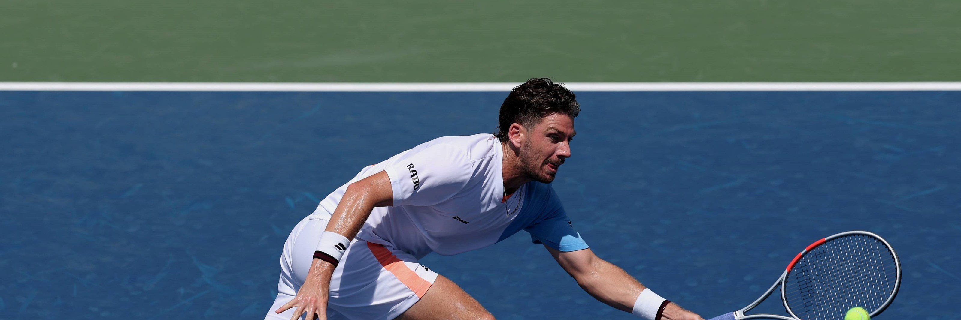 Cam Norrie stretches to hit a forehand in the first round of the 2025 US Open