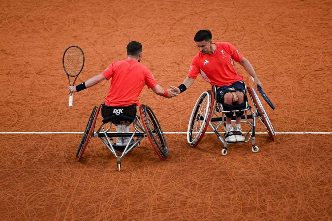 Alfie Hewett and Gordon Reid high five in the Paralympics semi-final