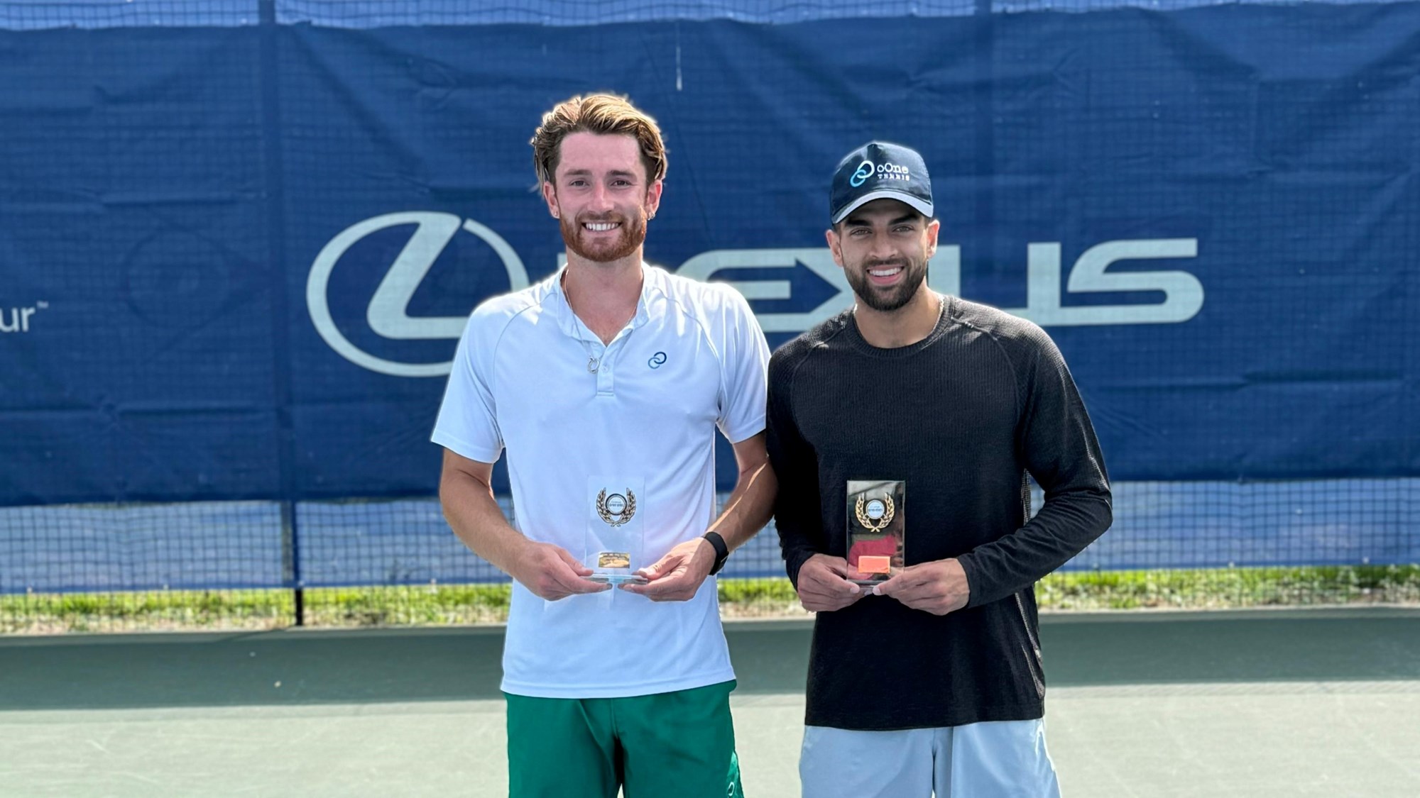 Britain's James Davis and Matthew Summers with the M25 Aldershot title