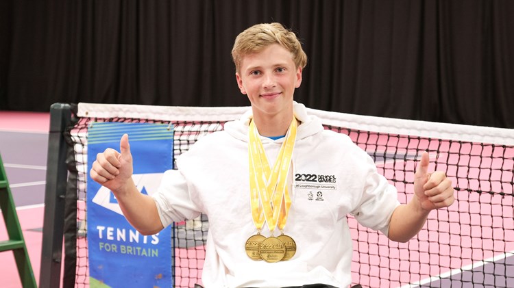 Ruben Harris posing a photo with his medals during the awards ceremony of the School Games 2022