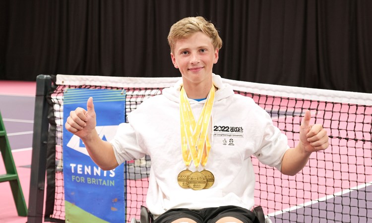 Ruben Harris posing a photo with his medals during the awards ceremony of the School Games 2022