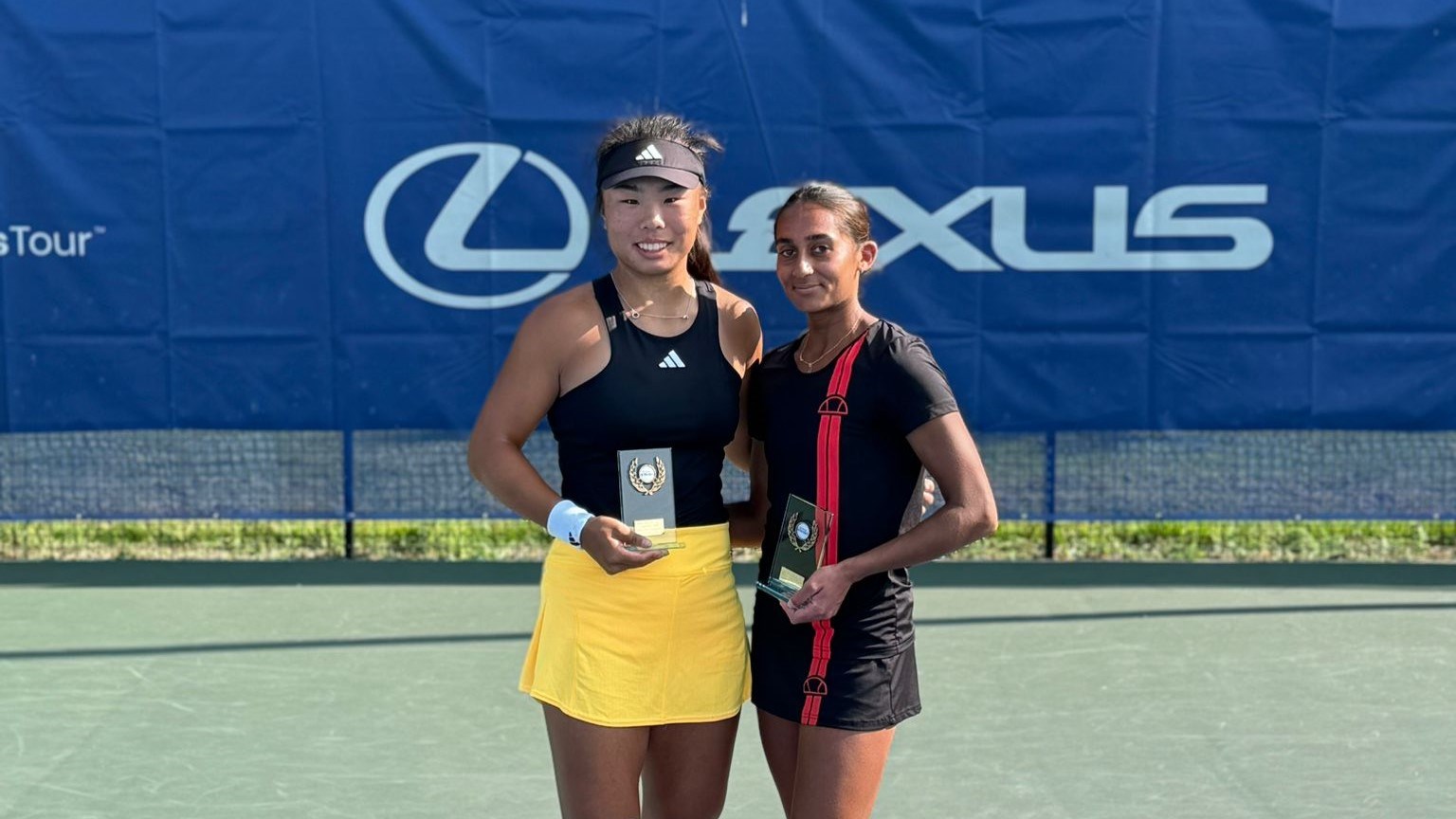 Britain's Mimi Xu and Naiktha Bains with the W35 Aldershot doubles title