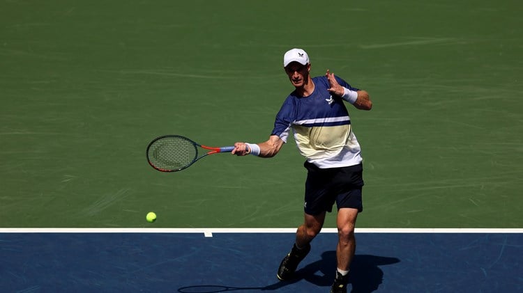 Andy Murray strikes a forehand at the US Open 2022
