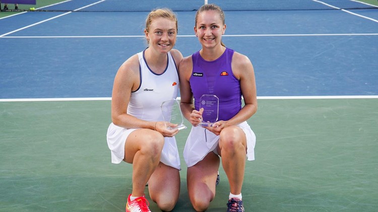 Alicia Barnett and Olivia Nicholls holding their first WTA title in Granby