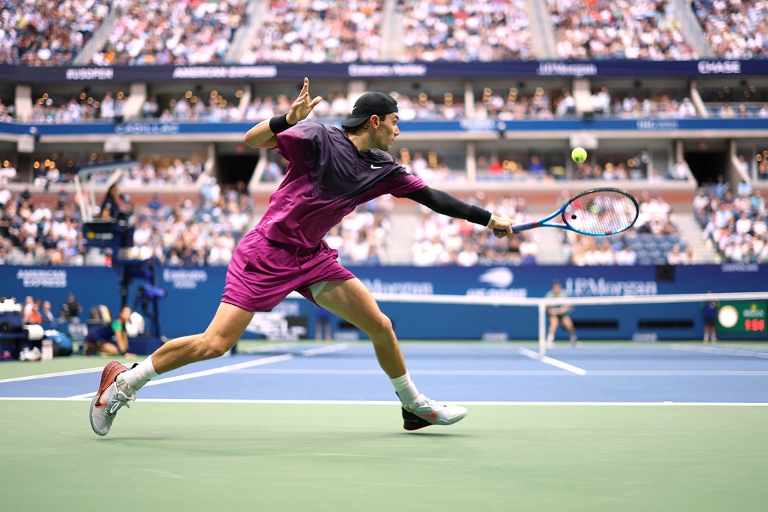 Jack Draper stretches for a backhand on Arthur Ashe at the US Open