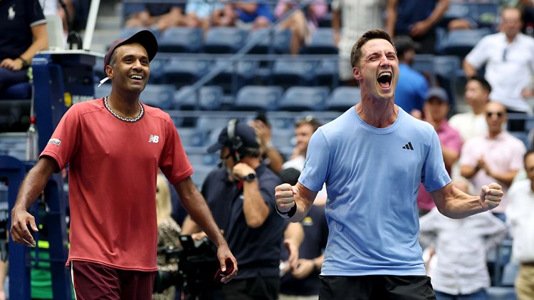 Rajeev Ram and Joe Salisbury celebrating on court 