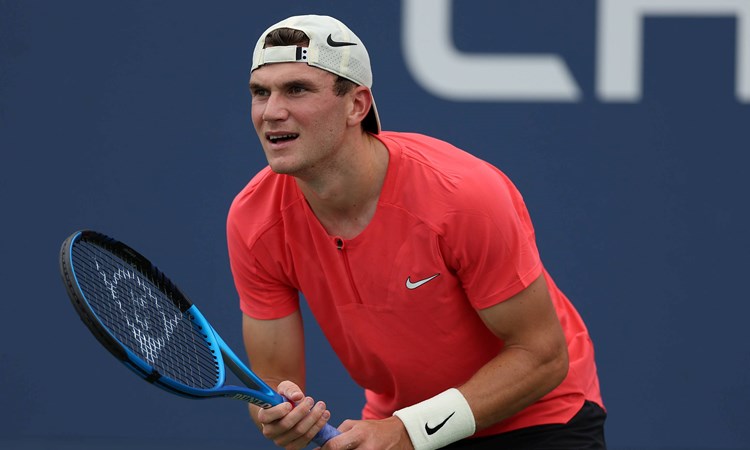 Jack Draper prepares to hit a return in the opening round of the 2023 US Open