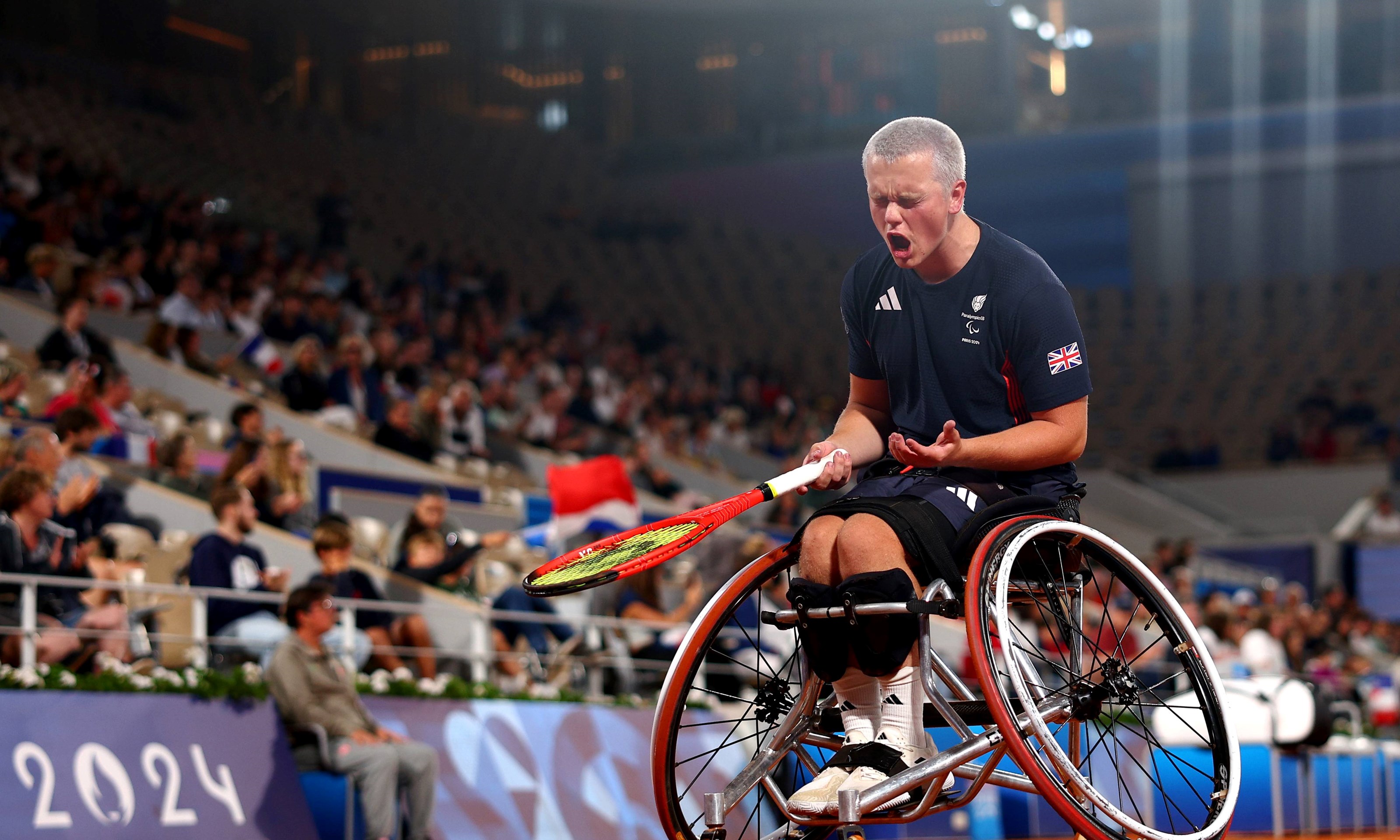 Ben Bartram of Team Great Britain or Paralympics GB celebrates a point as he compete against Guilhem Laget of Team France during their Men's Singles First Round match on day two of the Paris 2024 Summer Paralympic Games at Roland Garros on August 30, 2024 in Paris, France.