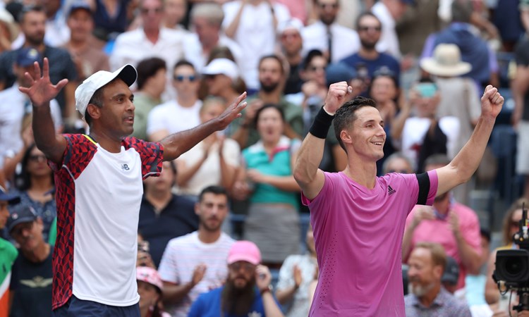 Joe Salisbury and Rajeev Ram celebrate winning the US Open 2022 men's doubles title