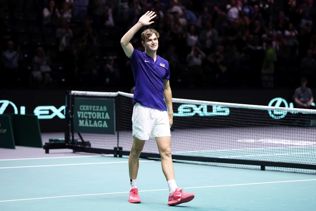 Jack Draper waves to the crowd after winning on his Davis Cup debut against Australia