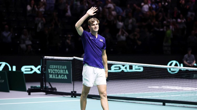 Jack Draper waves to the crowd after winning on his Davis Cup debut against Australia